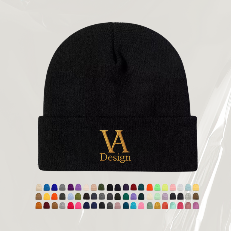 Baumwollmütze Schwarze Mütze mit goldenem Logo "VA Design" und Farbvarianten darunter.